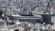The new 1.4 billion USD main venue for the 2020 Tokyo Olympic Games is pictured after being officially completed in Tokyo on November 30, 2019. The five-story stadium, designed by renowned Japanese architect Kengo Kuma, will seat 60,000 fans and nods to t