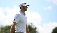 Aug 22, 2019; Atlanta, GA, USA; Dustin Johnson after putting on the 1st green during the first round of the Tour Championship golf tournament at East Lake Golf Club. Mandatory Credit: Adam Hagy-USA TODAY Sports
