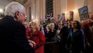 Bernie Sanders greets audience members at a campaign town hall meeting in Portsmouth, New Hampshire, US, November 24, 2019. Reuters/Brian Snyder