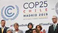 US House Speaker Nancy Pelosi (R) and US Senator Sheldon Whitehouse (D-RI) give a press conference conference during the UN Climate Change Conference COP25 at the 'IFEMA - Feria de Madrid' exhibition centre, in Madrid, on December 2, 2019. / AFP / PIERRE-