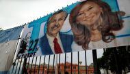 A placard depicting Alberto Fernandez and Cristina Fernandez de Kirchner, is seen outside the Presidential Palace Casa Rosada at in Buenos Aires, Argentina November 29, 2019. Reuters/Agustin Marcarian
 