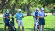 South Africa's George Coetzee (2ndL) and South Africa's Ernie Els (R) playing in shortsduring the first day of the Dunhill Championship golf tournament at Leopard Creek in Malelane, on November 28, 2019. / AFP / CHRISTIAAN KOTZE
