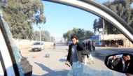 A broken window of the vehicle that was carrying Japanese doctor Tetsu Nakamura during the attack is seen in Jalalabad, Afghanistan December 4, 2019.REUTERS/Parwiz