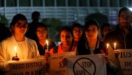 Resident doctors and medical students from All India Institute Of Medical Sciences (AIIMS) attend a candle-lit march to protest against the alleged rape and murder of a 27-year-old woman on the outskirts of Hyderabad, in New Delhi, India, December 3, 2019