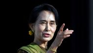 FILE PHOTO: Myanmar pro-democracy leader Aung San Suu Kyi arrives at Parliament buildings on the Stormont estate in Belfast, Northern Ireland October 24, 2013. REUTERS/Cathal McNaughton
