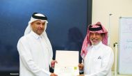 QICCA board member for International Relations Sheikh Dr Thani bin Ali Al Thani presenting the certificate to one of the participants.