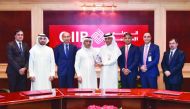 QIIB Deputy CEO,  Jamal Abdullah Al Jamal (fourth right), receiving the award from Citi Bank Qatar CEO, Amir Khan, at the ceremony. 