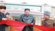 This picture released from North Korea's official Korean Central News Agency (KCNA) on December 8, 2019 shows North Korean leader Kim Jong Un attending a ceremony for the completion of the Yangdok County Hot Spring Cultural Recreation Center in South Pyon
