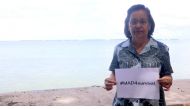 A view of President Hilda Heine of the Marshall Islands launching the #MAD4survival climate twitter campaign in the capital Majuro on December 7, 2019.