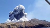 Smoke from the volcanic eruption of Whakaari, also known as White Island, is pictured from a boat, New Zealand December 9, 2019 in this picture grab obtained from a social media video - via REUTERS