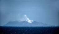Steam rises from the White Island volcano in Whakatane on December 10, 2019, after a volcanic eruption the day before. . / AFP / Marty MELVILLE 