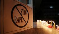 A poster is seen at a candle march by the doctors from AIIMS, New Delhi, to protest against the rape-murder of a 27-year-old woman in Hyderabad, India, December 3, 2019. Reuters / Anushree Fadnavis
 