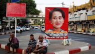 A poster supporting Aung San Suu Kyi as she attends a hearing at the International Court of Justice is seen in a road in Yangon, Myanmar, December 12, 2019. Reuters/Ann Wang