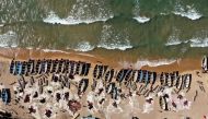 An aerial view of fishing boats on the shore of the Lake Malawi at the Senga village on May 20, 2019 in Senga, Malawi. AFP / Gianluigi Guercia  