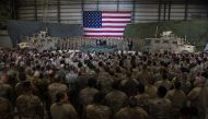 (FILES) In this file photo taken on November 28, 2019 US President Donald Trump speaks to the troops during a surprise Thanksgiving day visit at Bagram Air Field, in Afghanistan. AFP / Olivier Douliery