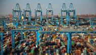 This file photo taken on November 28, 2019 shows containers stacked up at an automatic dock in Qingdao in Shandong province in east China. AFP
 
