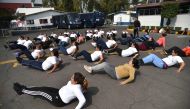 Mexican police officers excercise at a police unit in Mexico City on December 11, 2019. AFP / Rodrigo Arangua
 