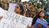 Students and activists hold placards and shout slogans during a protest againstCitizenship Amendment Bill in in Bangalore, India on December 16, 2019. AFP / Manjunath Kiran
 