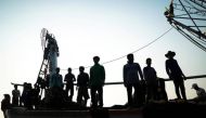 Migrant workers prepare to unload their catch at a port in Samut Sakhon province in Thailand, January 22, 2018. Reuters / Athit Perawongmetha 