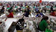 Employees work at a factory supplier of the H & M brand in Kandal province, Cambodia, December 12, 2018. Reuters / Samrang Pring