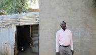 Williams Deonodji Ngargoto poses for a portrait outside his family home in N'Djamena, Chad. Photo taken November 25, 2019. Thomson Reuters Foundation/Nellie Peyton