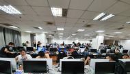 Chinese workers illegally working at an unlicensed online gambling firm are arrested by Philippine authorities at an office building in Quezon City, Metro Manila, Philippines, December 19, 2019. Picture taken December 19, 2019. Bureau of Immigrations/Hand