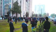 People gather outside buildings after a 6.1-magnitude earthquake in Islamabad on December 20, 2019. A strong earthquake rattled Afghanistan and Pakistan on December 20 afternoon, the US Geological Survey said, forcing residents into the streets in Islamab