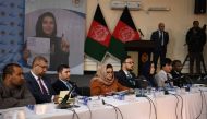 Head of the Afghan Independent Election Commission (IEC) Hawa Alam Nuristani (C) takes part in a press conference to announce the preliminary elections results in Kabul on December 22, 2019. (AFP / FARSHAD USYAN)
 