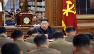 North Korean leader Kim Jong Un speaks during the Third Enlarged Meeting of the Seventh Central Military Commission (CMC) of the Workers' Party of Korea (WPK) in this undated photo released on December 21, 2019. KCNA via REUTERS