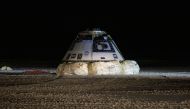 This NASA photo shows the Boeing CST-100 Starliner spacecraft after it landed in White Sands, New Mexico, on December 22, 2019. AFP / NASA / Bill Ingall