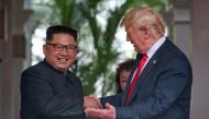 File photo of US President Donald Trump meeting North Korean leader Kim Jong Un at the Capella Hotel on Sentosa island in Singapore, June 12, 2018. Kevin Lim / The Straits Times / via Reuters