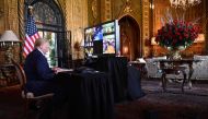 US President Donald Trump makes a video call to the troops stationed worldwide at the Mar-a-Lago estate in West Palm Beach Florida, on December 24, 2019. AFP / Nicholas Kamm
 