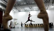Representative image: Dancers of the Monte-Carlo ballet warm up in a room in the backstage, during a class as part of the rehearsal of the ballet show 