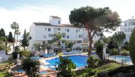 A general view of a swimming pool where three members of the same British family, a father and two children, were found on Christmas Eve at a Costa del Sol resort in Las Lagunas de Mijas, southern Spain December 25, 2019. Reuters/Jon Nazca
 