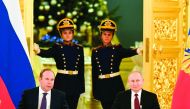 Russian President Vladimir Putin (R) and Chief of Staff of the Presidential Executive Office Anton Vaino attend a meeting with business community at the Kremlin in Moscow on December 25, 2019. AFP / Alexander Nemenov