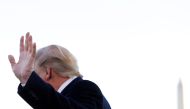 Donald Trump waves as he turns away from answering questions from reporters to depart for travel to Mississippi from the South Lawn of the White House, November 1, 2019. Reuters / Tom Brenner