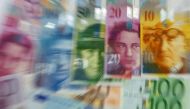 FILE PHOTO: Various Euro banknotes lay next to various Swiss Franc notes in this picture illustration at a bank in Warsaw, July 18, 2011. Reuters / Kacper Pempel