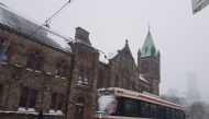 A streetcar travels a street in Toronto, Canada, December 7, 2019.  AFP / Olivier Monnier 