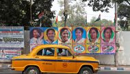 A taxi drives past a poster of Mamata Banerjee, the Chief Minister of West Bengal state, in Kolkata, February 9, 2019. Reuters / Rupak De Chowdhuri