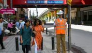 The model officers have received a mixed reaction from commuters about whether the dummy ploy would work, with some locals praising police for thinking outside the box. AFP / Manjunath Kiran