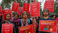 Demonstrators display placards as they attend a protest rally against a new citizenship law, in Kolkata, India, January 3, 2020. Reuters/Rupak De Chowdhuri


