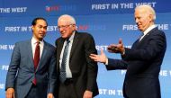 FILE PHOTO: Democratic US presidential candidates Julian Castro, Bernie Sanders and Joe Biden stand on stage at a First in the West Event at the Bellagio Hotel in Las Vegas, November 17, 2019. Reuters/Carlo Allegri
 