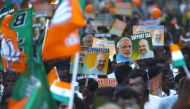 Supporters of the Bharatiya Janata Party (BJP) wave party flags and hold placards in support of the government's Citizenship Amendment Act (CAA) and the National Register of Citizens (NRC) during a rally in Chennai on January 7, 2020. Protests were held a