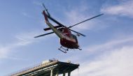 Fire fighters inspect from the helicopter the site of the collapsed Morandi Bridge in the port city of Genoa, Italy, August 14, 2018. Reuters / Massimo Pinca
