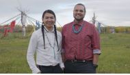 Dr James Makokis with Anthony Johnson, a Navajo two-spirit community health worker, on the land where Kehewin Cree Nation hosts sacred sundance ceremonies, in Kehewin Cree Nation, Alberta, Canada, September 18, 2019. Thomson Reuters Foundation/Ryan Varga