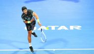 Fernando Verdasco of Spain returns the ball to Filip Krajinovic of Serbia during their pre-quarter-final match yesterday.