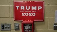 A Trump 2020 campaign poster is seen on a fir alarm during a campaign rally by Donald Trump in Fayetteville, North Carolina, US, September 9, 2019. Reuters / Kevin Lamarque