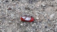 A child's shoe is pictured on January 8, 2020 at the scene of a Ukrainian airliner that crashed shortly after take-off near Imam Khomeini airport in the Iranian capital Tehran. AFP / ISNA / Borna Ghassemi
 
 