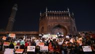 Demonstrators carry placards and hold candles during a silent protest against a new citizenship law at Jama Masjid, in the old quarters of Delhi, India, January 10, 2020. Reuters/Anushree Fadnavis
 