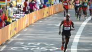 Wilson Kipsang Kiprotich of Kenya runs to win bronze in the men's marathon on August 12, 2012 during the London Olympic Games. AFP / Olivier Morin 